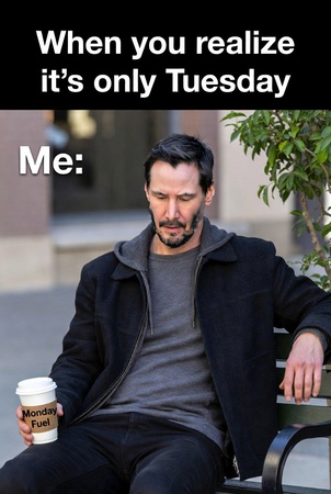 tired man holding Monday coffee